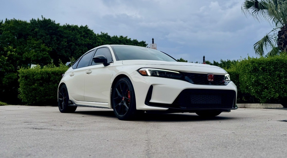 White Honda Civic Type R photographed from a low angle
